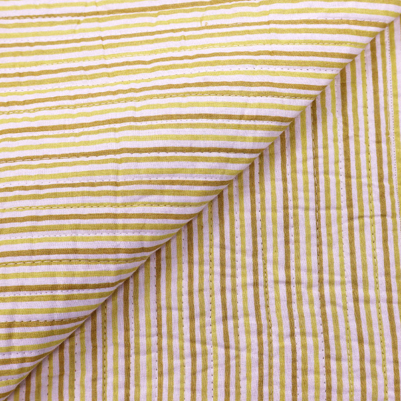100% Cotton, including 100% Cotton Wadding Quilted Cotton Fabric - Yellow and Blue Floral with yellow stripe on the reverse