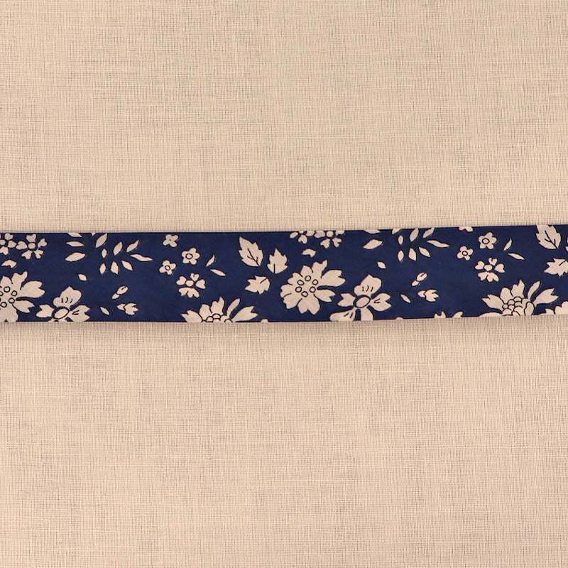 100% Cotton Liberty Fabric Bias Binding  in their Capel design featuring a white floral print on a navy blue background.