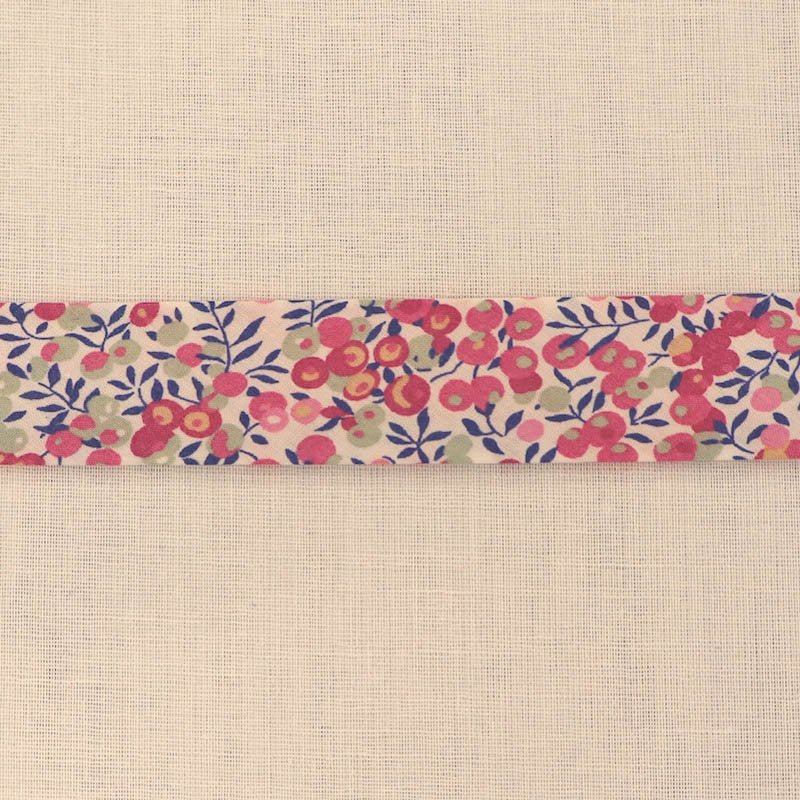 100% Cotton Liberty Fabric Bias Binding Wiltshire D Pink featuring a pale pink and pale green berry print with blue stems on a cream background
