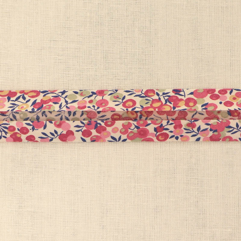 100% Cotton Liberty Fabric Bias Binding Wiltshire D Pink featuring a pale pink and pale green berry print with blue stems on a cream background