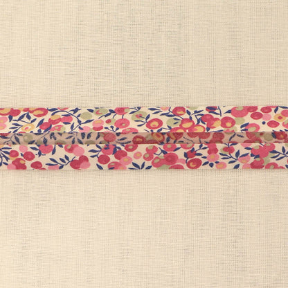100% Cotton Liberty Fabric Bias Binding Wiltshire D Pink featuring a pale pink and pale green berry print with blue stems on a cream background