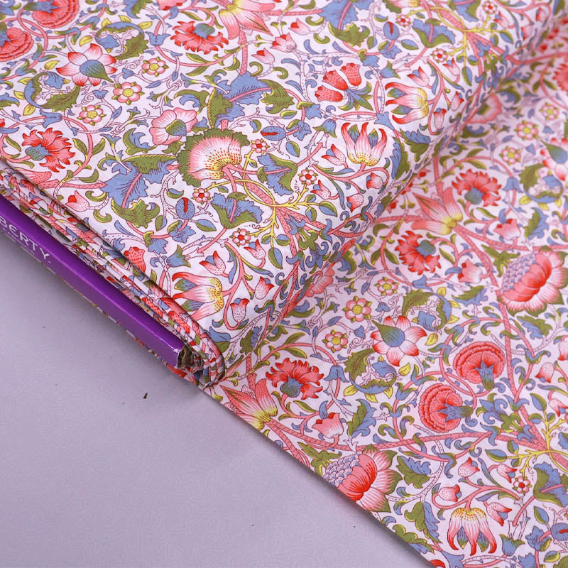 100% Cotton Tana Lawn™ Liberty Cotton Lawn Fabric - Lodden- pink, green and blue floral design on a white background