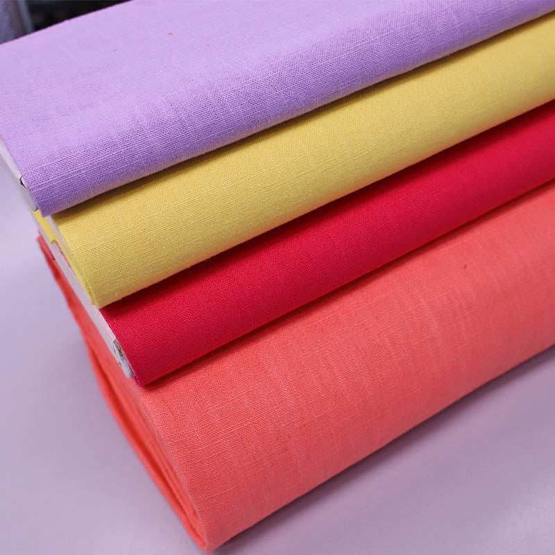 Linen dressmaking fabrics in purple, yellow, red and pink