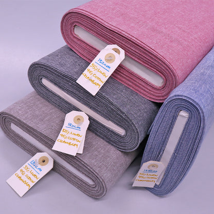 Linen and cotton blend chambray fabrics in pale blue, pink, grey and mink brown