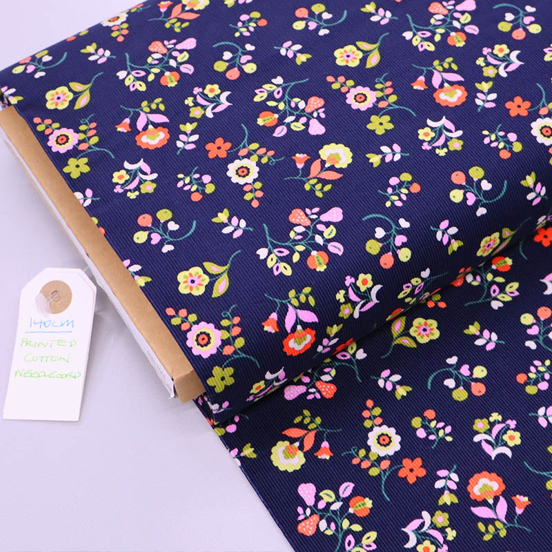 100% Cotton Navy Blue with yellow and orange Floral Needlecord Fabric