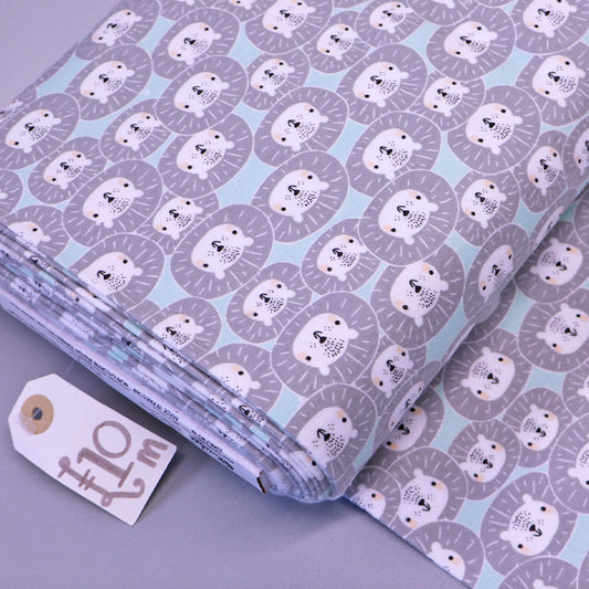 Grey and blue brushed cotton flannel fabric with children's lion print