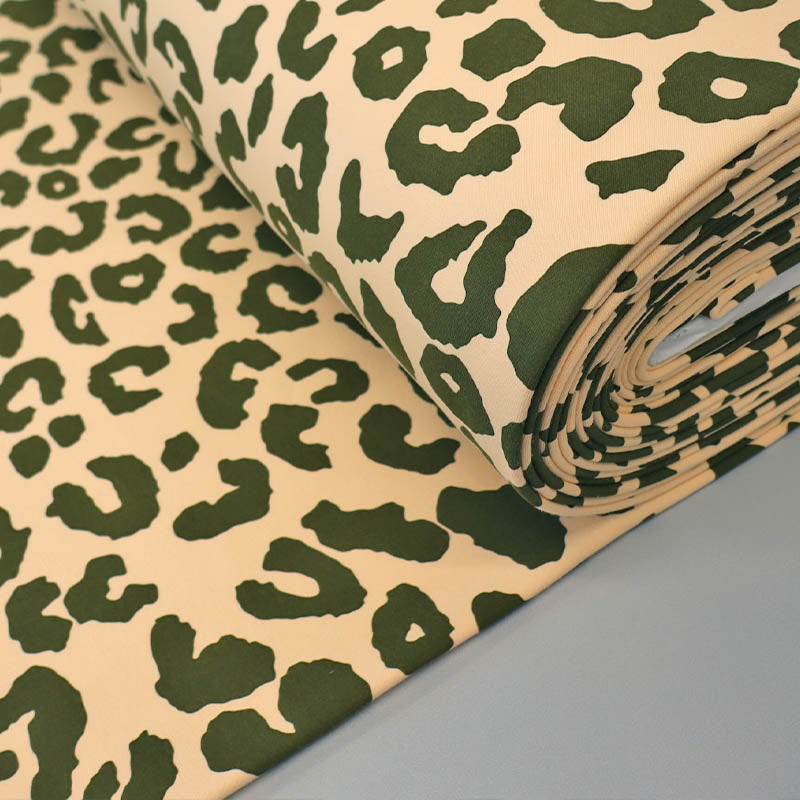 82% Organic Cotton 18% Recycled Polyester Cream Sweatshirt fabric  with an olive green Leopard Print