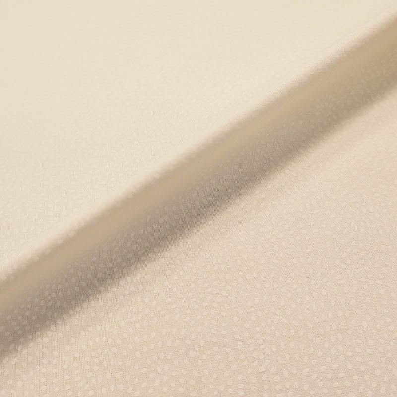 100% Cotton White Blender Fabric with white spots in a spiral design on a white background
