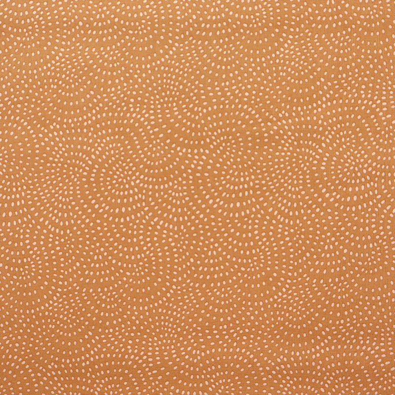100% Cotton Orange Blender Fabric featuring a subtle print of white spots in a spiral on a soft orange background.