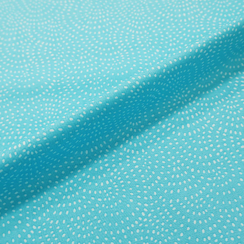 100% Cotton Turquoise Blender Fabric with a subtle print of white spots in a spiral on a turquoise blue background.