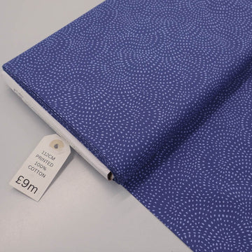 100% Cotton Dark Blue Blender Fabric with a spiral spot pattern