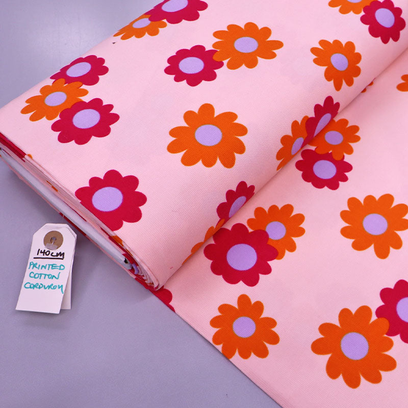 100% Cotton Pink Floral Needlecord Fabric - Orange and Lilac Daisy