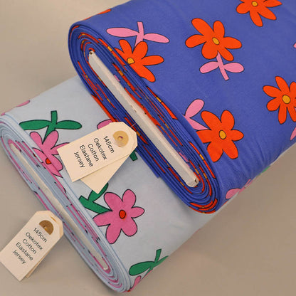 95% Organic Cotton 5% Elastane
Floral Jersey Fabrics in pale blue and dark blue with Daisy Print