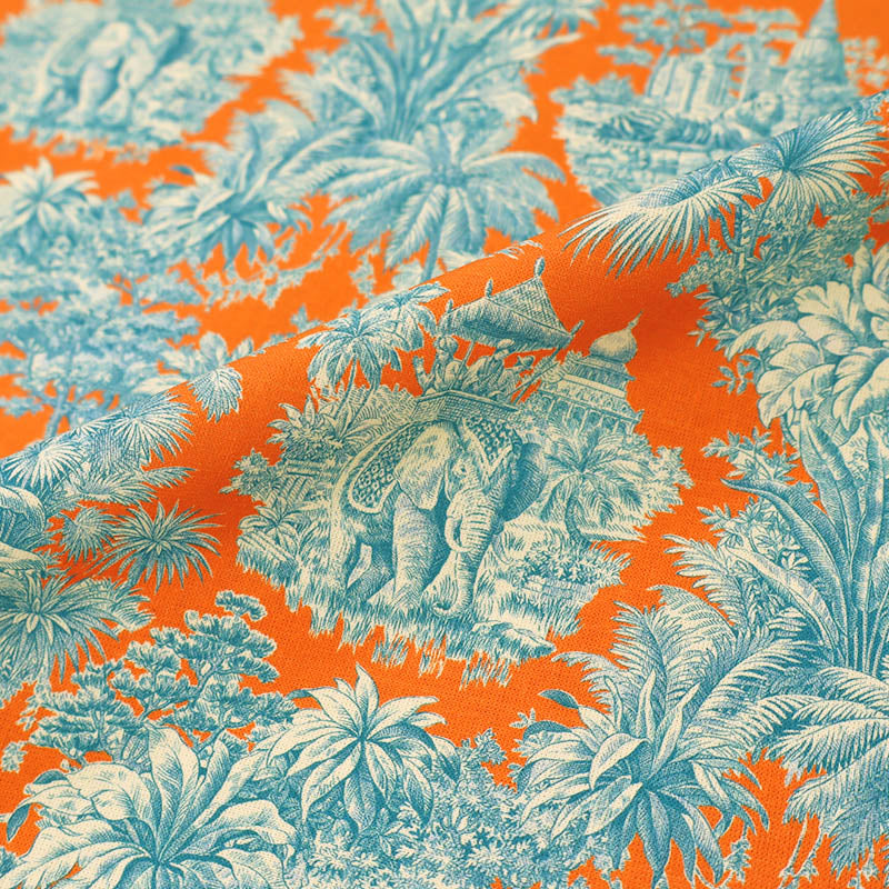 100% Cotton Fabric - Elephants and Tigers in a tropical setting in bright blue and orange.