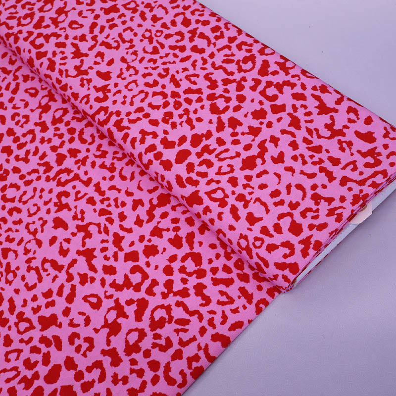 100% Polyester Pink and Red Leopard Print Polyester Fabric