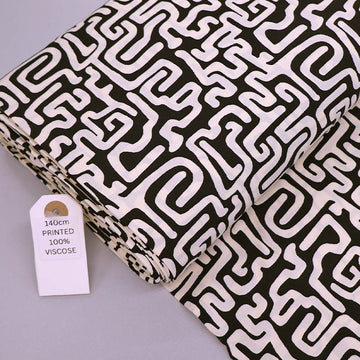 100% Viscose Fabric - Black and Cream Maze Print