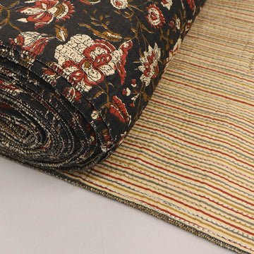100% Cotton, including 100% Cotton Wadding Quilted Indian Cotton Fabric - Red and Black Floral with narrow stripe on the reverse