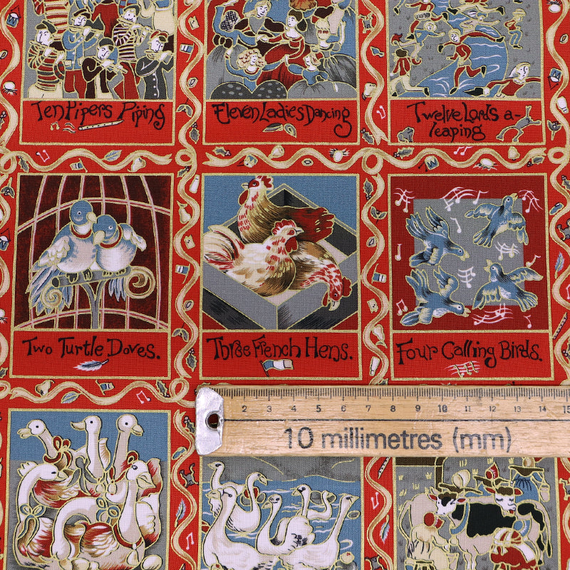 Christmas fabric panel in red featuring images from the 12 days of xmas