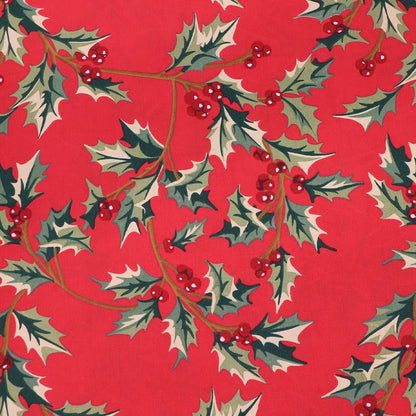 Red cotton Christmas fabric with green holly and berry print