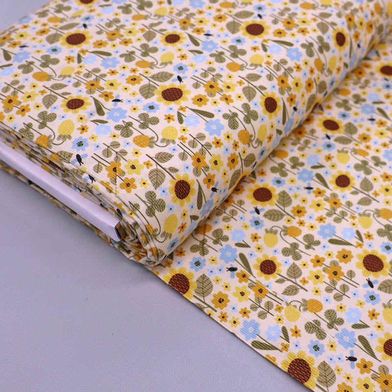 Cream Floral Needlecord Fabric - Yellow sunflowers