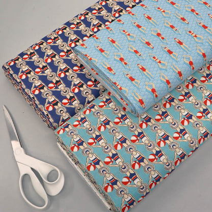 Navy and Pale blue fabrics featuring retro swimming design. 