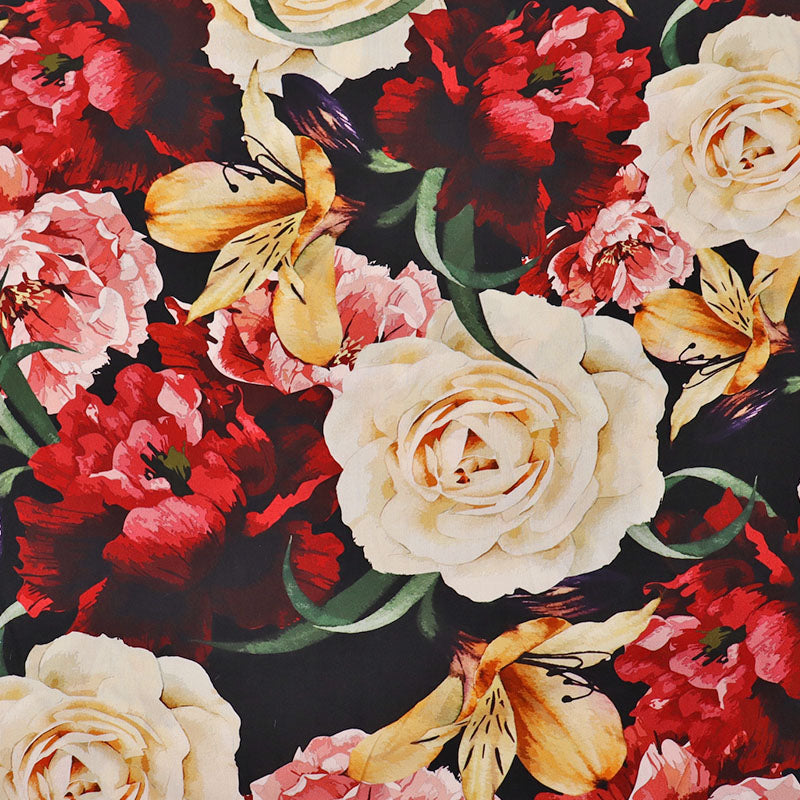 100% Viscose Black and Red Floral Viscose Fabric featuring a bold floral design in red, cream and yellow on a black background.
