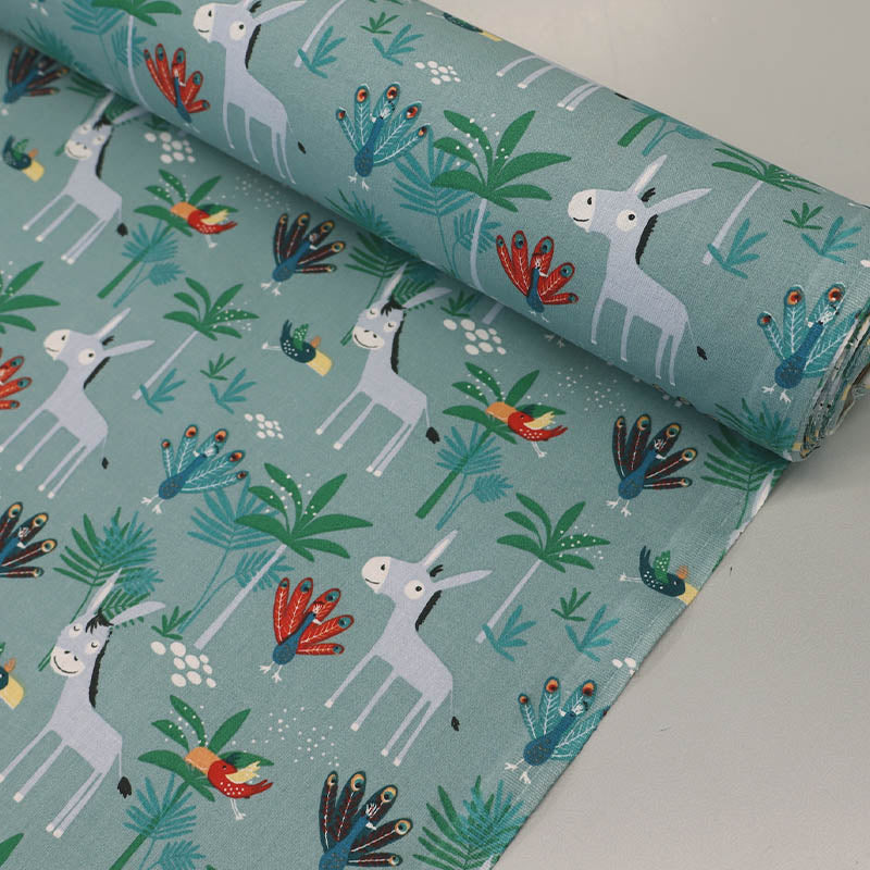 100% Cotton Aqua Blue Novelty Cotton Fabric - Donkey and Peacocks