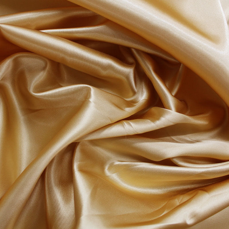 gold satin dressmaking fabric