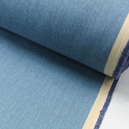 Mid Blue and Navy herringbone polyester furnishing fabric