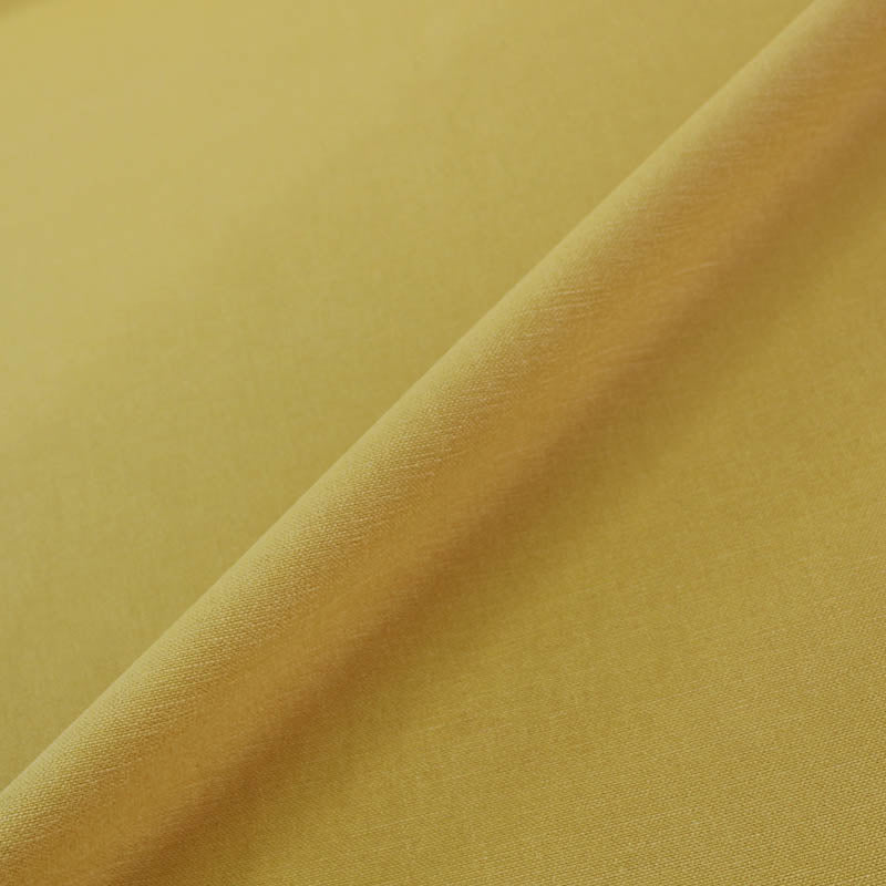 Chartreuse yellow, furnishing fabric brushed with a panama weave texture.