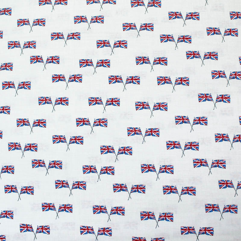 A fabric with a Union Jack print, featuring crossed flags of the UK on a cream background, suitable for bunting, patchwork, and quilting.