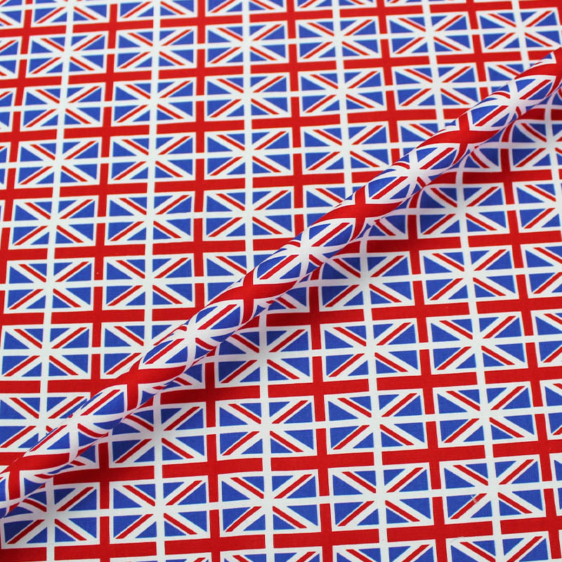 100% Cotton Union Jack Flag Fabric
 in red, white and blue. With the flags in neat rows 