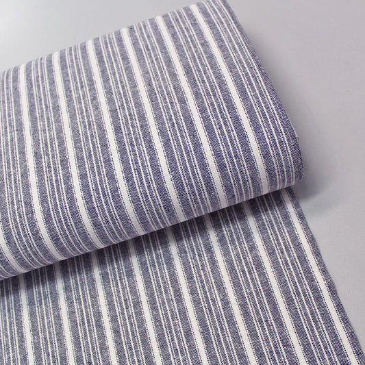 Linen and cotton blend navy and cream striped dressmaking fabric