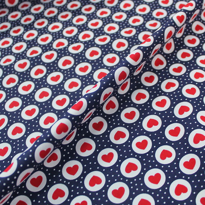 Dressmaking Printed Cotton Poplin- Bakewell Hearts - Navy/Red